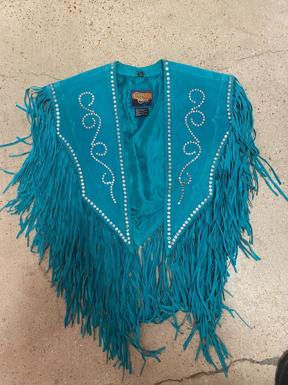 Turquoise Fringe Vest with Studded Swirl Detail